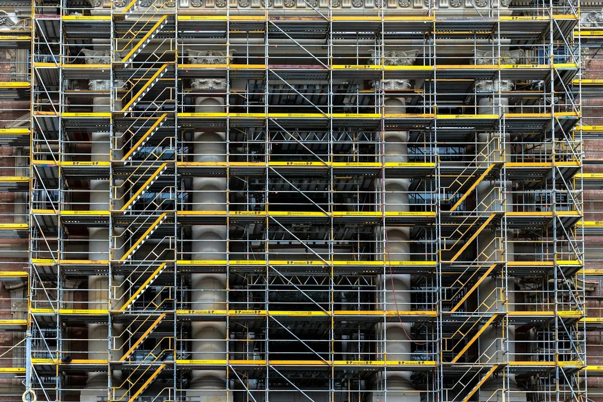 Grey and brown concrete building under construction in Berlin